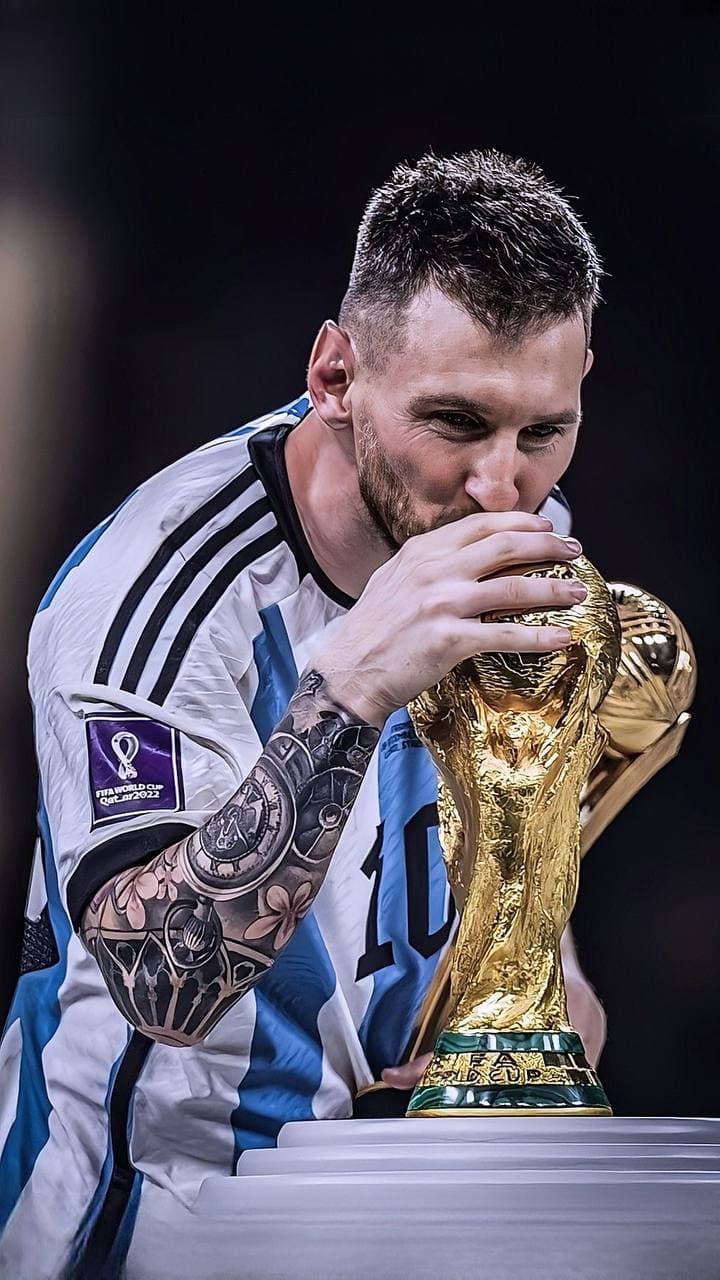 Lionel Messi with the World Cup